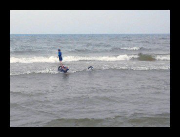 jozie-and-seargent-mitchell-in-lake-michigan.jpg